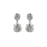 girls round moissanite stone earrings